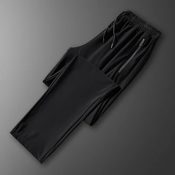 2023 Новые летние тонкие быстросохнущие брюки из ледяного шелка, повседневные брюки с эластичной резинкой на талии, свободные мужские черные Легкие длинные брюки